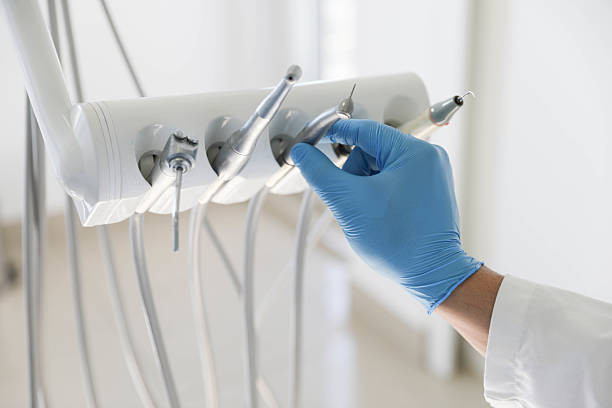 Professional Emergency Dentist technician working in Grand Forks, ND